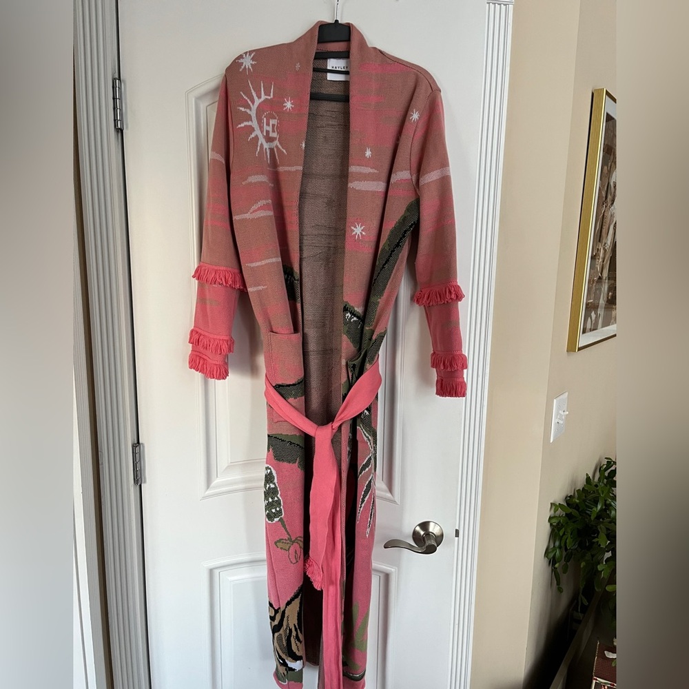 Hayley Menzies long pink cardigan.